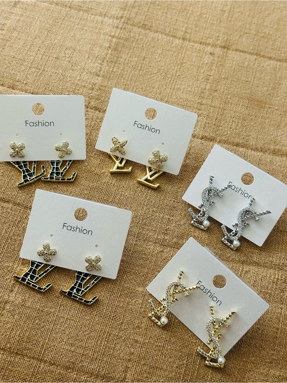 Gold and Silver Crystal Logo Drop Earrings -